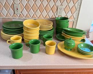 Fiestaware green and yellow dinnerware, yellow pieces show more wear, good used condition otherwise