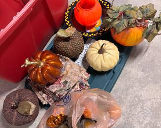 Large tote of fall decorations with pumpkins, sugar gourds & more
