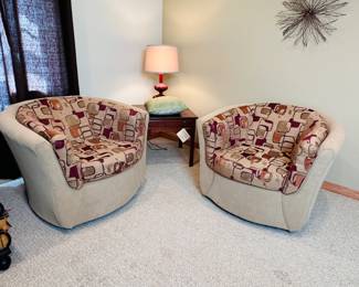 Pair of LaZboy mod pattern barrel chairs with swivel base, minor spots 32"H x  approx. 40"W (these are in lower level)