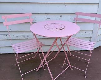 Vintage metal pink patio chairs and table, some wear to finish, the table is 28"W
