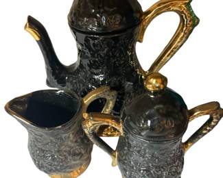 Unique teapot with sugar and creamer