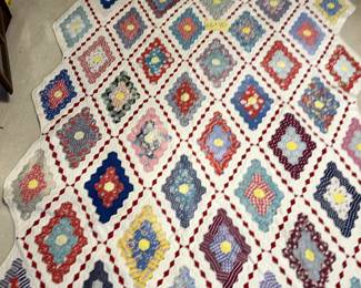 66x80. vintage hand made field of diamonds quilt
