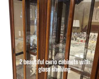 Set of beautiful curio cabinets with glass shelves 