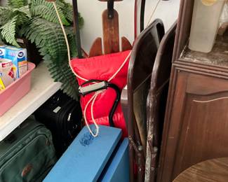 Garage - vintage sled - folding chairs - rubber items 