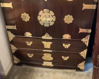 Oriental piece in master bedroom