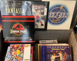Sealed records, puzzles, and collectibles.