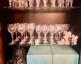 Tiffany company stems, fine European crystal stems on top shelf.