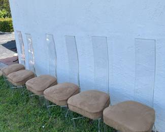 Lucite dining chairs. 