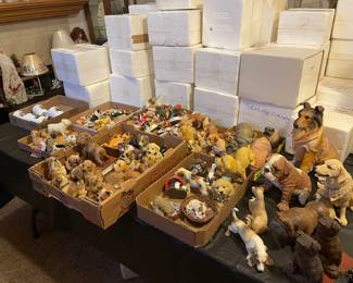 100s of dog figurines and plate collection