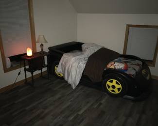 Coming Saturday to the sale from the family, a twin size Batman bed.