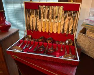 Multiple sets of vintage flatware