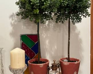 Plants, Waterford crystal candle holders, stained glass panel