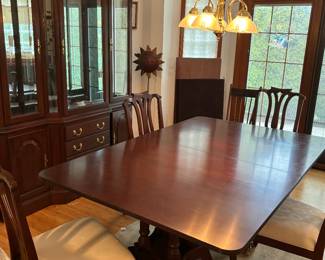 Stunning dining table and display cabinet