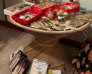 Very nice large rattan spun hour glass table