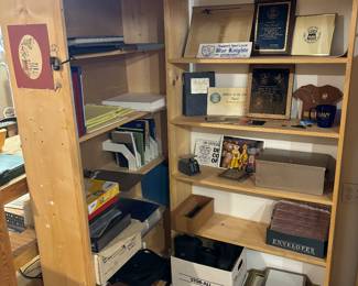 Hand built wooden shelves, some on rollers