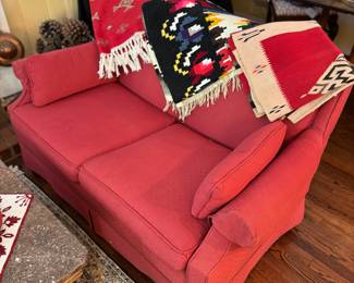 Nice red love seat, Native American blankets