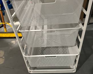 Elfa metal basket organizer from The Container Store 21" d x 18" w x 30" t: $50