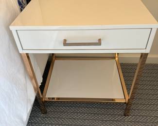 Pair of white and gold end tables: 20" w x 18" d x 23" t. $200 ea.