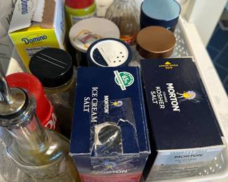 Assorted oils and seasonings with white plastic container $5