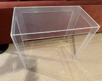 Lucite tables (2 available) 33" w x 18" d x 28" t. $75 ea.