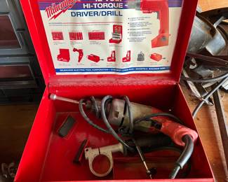 Electric drill with case