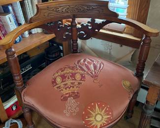 Corner Chiar on Brass Casters