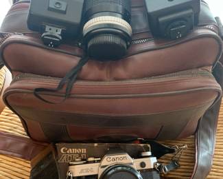 AE-1 Canon camera with bag and accessories 