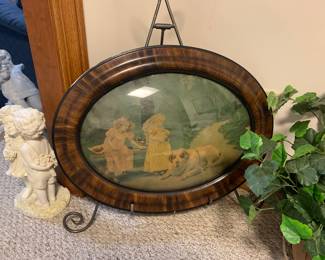 Vintage oval frame with curved glass