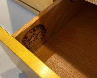 close up of the markings the gold leaf Kittinger cabinet