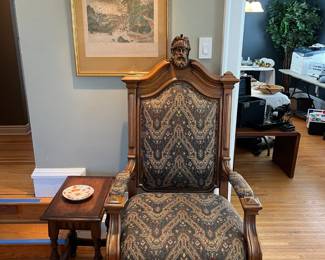 Monumental Antique Figural Church / Heavily Carved Arm Chair along side a Kittinger side table