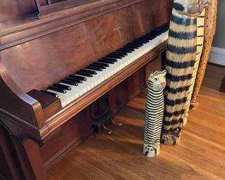 a wonderful inlaid Krakauer console piano