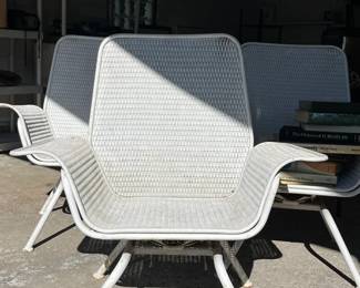 a set of three Mid-century modern outdoor chairs