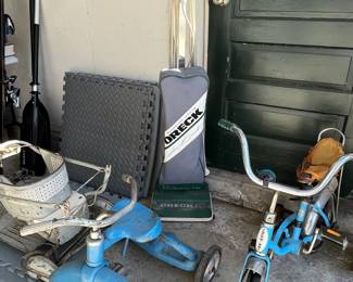 Oreck vacuum cleaner, vintage child's tricycle, stroller and Schwinn banana set bicycle