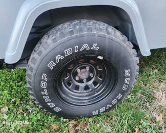 1995 Jeep with small block Chevy motor, has moderate build. Double pumper Edelbrock high rise manifold