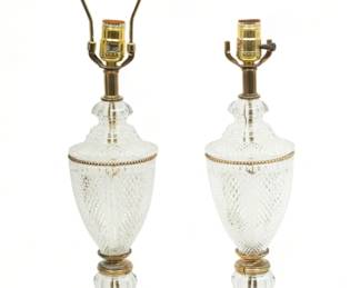 Pair of French Cut Crystal & Brass Lamps, 20th C., H 26" Dia. 5" | Hand-cut French crystal shafts on marble bases. Brass accent fittings. Terminating on variegated black marble discs. Circa 20th century.