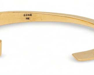 Modern 14k Gold Bangle Bracelet, by Cohn, Ca. 1980, W 2.5" 17.7g | Having an open modernist end. Impressed 14K. Provenance: From a Grosse Pointe Park private collector.