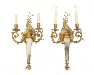 Decorative Crafts Inc. (American) Maison Bagues Style Crystal & Brass Sconces, H 23" W 12" Depth 4.75" 1 Pair | the electrified sconces offer a peacock on a torch form, in the style of Maison Bagues. Bearing signature branding labels affixed to the backsides.