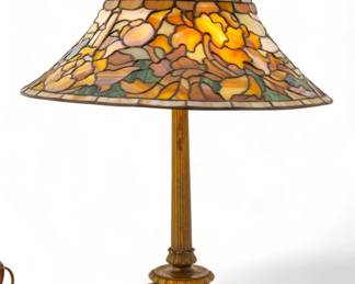 Duffner & Kimberly (American (Est. 1905)) Art Glass Table Lamp Ca. 1910-1930, "German Renaissance", H 24" Dia. 21" | a fine example of this rare shade and base. Shade having design of a German castle with allover design of fall leaves. on a bronze footed base. an example of this shade is illustrated on p.225 of Mosaic Shades II by Paul Crist. Provenance: Property from the Estate of David Walicki, East Tawas, MI