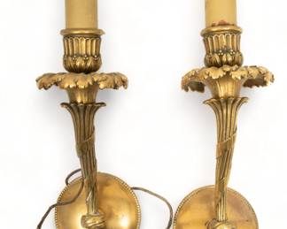 French Louis XVI Style Bronze Single-Light Wall Sconces, 20th C., H 15" W 5" Depth 3.5" 1 Pair | D'ore bronze reeded floral trumpet arms support floral blossom bobeches.