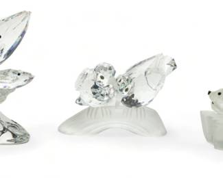 Swarovski (Austrian) 'Annual Edition' Crystal Figurines, 'The Seals', 'The Turtledoves' & 'The Whales', H 2" W 3" Depth 4" 3 pcs | the collection includes one 1991 'Save Me - the Seals' figurine (H 2" X W 3" X D 4"), one 1989 'Amour - the Turtledoves' figurine (H 2.75" X W 3.5" X D 3.5"), and one 1992 'Care for Me - the Whales' figurine (H 4" X W 2" X D 3.5"). Each accompanied with original boxes, measuring H 7.5" X DIA 7.25". Provenance: Property from a Brighton, MI private collection. 