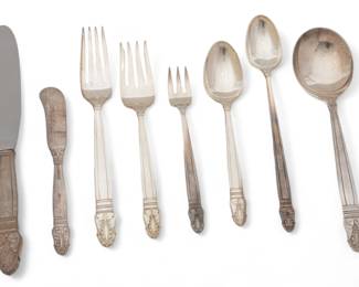 International Silver (American) 'Norse' Sterling Silver Flatware, Service for 12, 115.7t oz 111 pcs | the collection includes 12 dinner forks (L 7"), 12 salad forks, (L 6.25"), 24 teaspoons, 12 iced tea spoons, 12 seafood forks, 12 soup spoons (L 7.25"), 12 steel bladed dinner knives (L 9"), 1 master butter knife (L 7"), 1 sugar spoon, 1 serving spoon, 1 meat serving fork, and 11 butter knives (L 4.5"). Each bearing signature branding, hallmarks, and pattern title to the undersides. Total weight: 115.7 troy ounces.