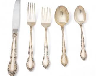 Heirloom (American) 'Grandeur' Sterling Silver Flatware, Service for 6, 34.6t oz 37 pcs | the collection includes 8 place knives (L 9"), 6 place forks (L 7"), 6 salad forks (L 6.5"), 6 teaspoons, 6 cream soup spoons, 1 gravy ladle (L 5.5"), 1 master butter knife, 1 cold meat fork, 1 serving spoon (L 8.25"), 1 flat tomato server. Accompanied with hinged tarnish proof storage chest (H 3.5" X W 15.25" X D 11.25"). Total weight: 34.6 troy ounces (weighable). Provenance: From a Prominent Print Collector, Clarkston, Michigan