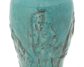 Pewabic Pottery 90th Anniversary Commemorative Vase  1993, H 11.5" Dia. 6" | Turquoise glaze with figures in relief accented in black. Artist Proof. PEWABIC POTTERY 90TH ANNIVERSARY COMMEMORATIVE VASE, 1993, H 11.5", DIA 6.5",  Edition of 200  Having a Bauer green glaze with five bas relief figures of important people in the history of Pewabic Pottery. These figures include the founder Mary Chase Perry, co-founder Horace Caulkins, master potter Joseph Heerich, Michigan State University professor James Powell and supervisor Julius Albus.