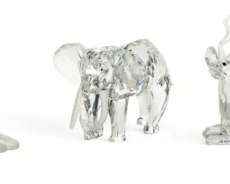 Swarovski (Austrian) 'Inspiration Africa' Crystal Figurines, 'The Kudu', 'The Elephant' & 'The Lion', H 4" W 1.5" L 3.5" 3 pcs | the collection includes one 'The Kudu' figurine (H 4" X W 1.5" X L 3.5"), one 'The Elephant' figurine (H 3.5" X W 3.5" X L 4.5"), and one 'The Lion' figurine (H 2.5" X W 3" X L 5"). Each accompanied with original boxes, measuring H 7.5" X W 7.5" X D 6.5" respectively. Provenance: Property from a Brighton, MI private collection. 