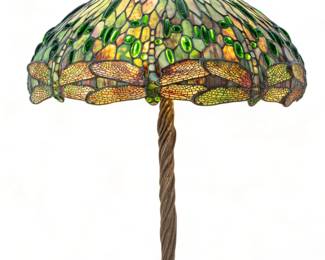 Tiffany Style American Art Glass Dragonfly Lamp, 20th C., H 28" Dia. 22" | Green dragonfly lampshade with green jewel glass accents and bronze overlay wings. Shade only: H 11", Dia. 22". Atop a patinated bronze twisted vine base, H 27.5", Dia. 10". Provenance: Property from the Estate of David Walicki, East Tawas, MI