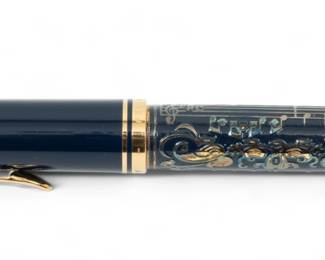 Pelikan (German) 'Concerto' Fountain Pen L 5.5" | the limited edition (3517/4000) 'Concerto' fountain pen features an 18k gold nib. the lot is accompanied with original pamphlet and original packaging, measuring H 2" X W 8.25" X D 5" overall.