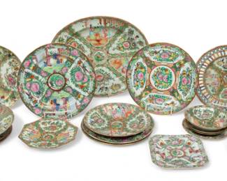 Chinese Rose Medallion Porcelain Ca. 20th. C, Charger, Plates, Bowls, Saucers, Etc. 18 pcs | Collection of 18 pieces of Chinese rose medallion porcelain. Most made in Hong Kong. Lot includes one charger (H 12", W 15"), 10 larger plates (approx. 10" Dia.),  3 smaller dishes (approx. 7" to 8.5" Dia.), 3 saucers (Dia. 5.5"), 1 bowl (Dia. 6").