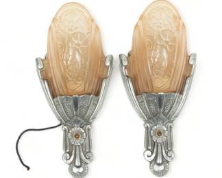 Lincoln Manufacturing Co. (Detroit) Art Deco Aluminum And Glass Electrified Sconces, Ca. 1930, H 13" W 6" Depth 4" | the sconces offer rose colored pressed glass globes with fitted aluminum frames. Each with 'Lincoln' and '10560' to the backsides of the metal. Circa 1930.