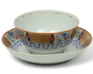 Chinese Export Porcelain Tea Bowl And Saucer, Ca. 1750, H 2.5" Dia. 6" 2 pcs | the matching set offers rose and flower motifs with repetitious vignette and floral swag forms. Accented with fired gold trim. the tea bowl measures H 2" X DIA 4.25". the saucer measures H 1.25" X DIA 6". Circa 1750. Provenance: Property from a private collection, Grosse Pointe Farms, Michigan.