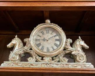 Vintage Mantel Clock Gold Patina with Horse heads on each side $150: Timeless Elegance: Vintage Mantel Clock with Gilded Finish & Horse Accents